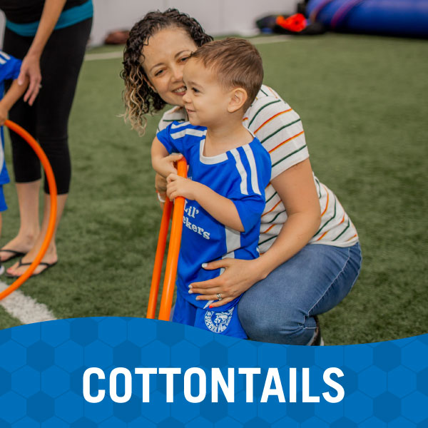 Mother and child playing in Lil' Kickers Cottontails class