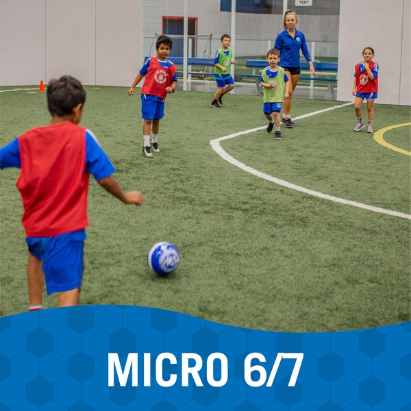 Children play soccer during Lil' Kickers Micro 6/7 class