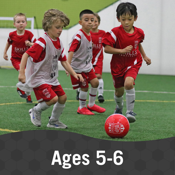 Children playing soccer during Skills Institute 5/6 class