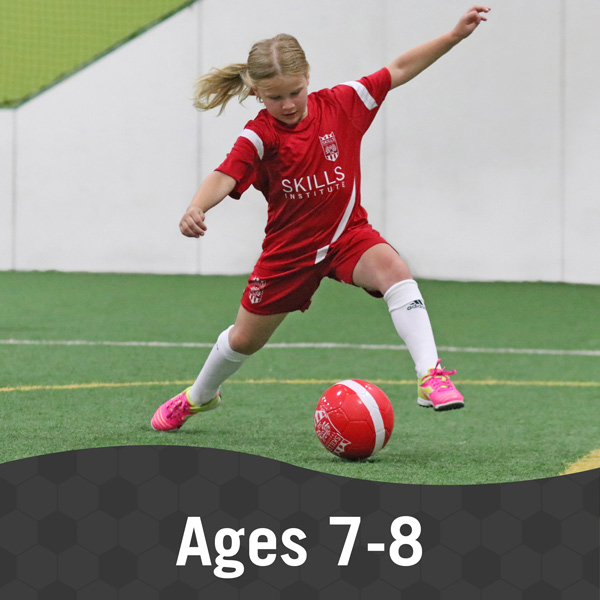 Girl practices soccer during Skills Institute 7/8 class